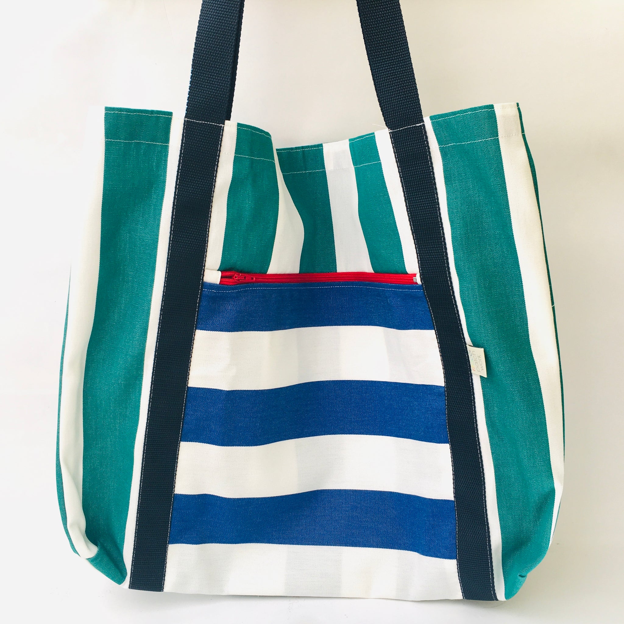 Saco de lona às riscas com fecho